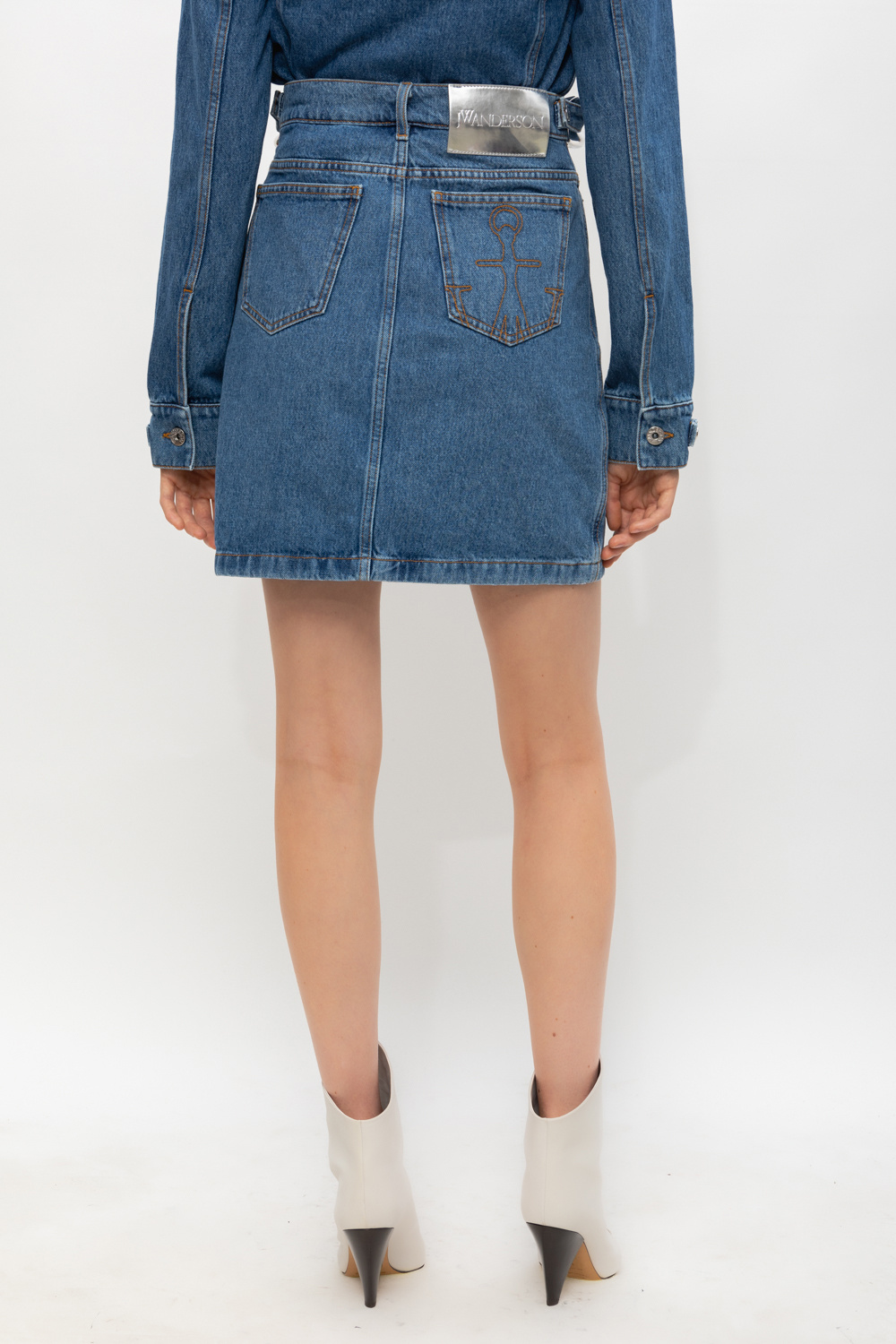 【送料&関税込】J.W. Anderson Blue Denim Miniskirt Twisted denim miniskirt in blue - JW Anderson | Mytheresa